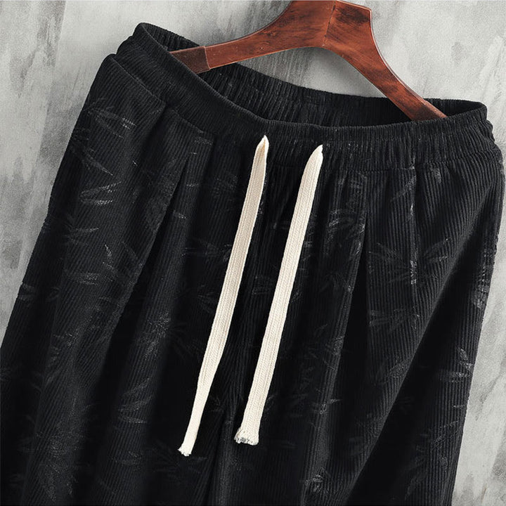 Pantalones anchos de pana con cordón de algodón y hojas de bambú y Buddha Stones para hombre con bolsillos