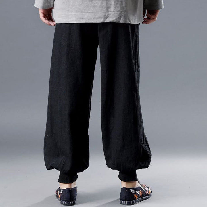 Pantalones de hombre de lino ramio con cremallera frontal de color liso y bolsillos con Buddha Stones