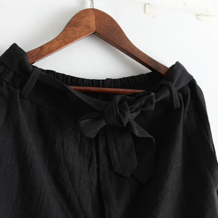 Pantalones de hombre de lino ramio con cremallera frontal de color liso y bolsillos con Buddha Stones