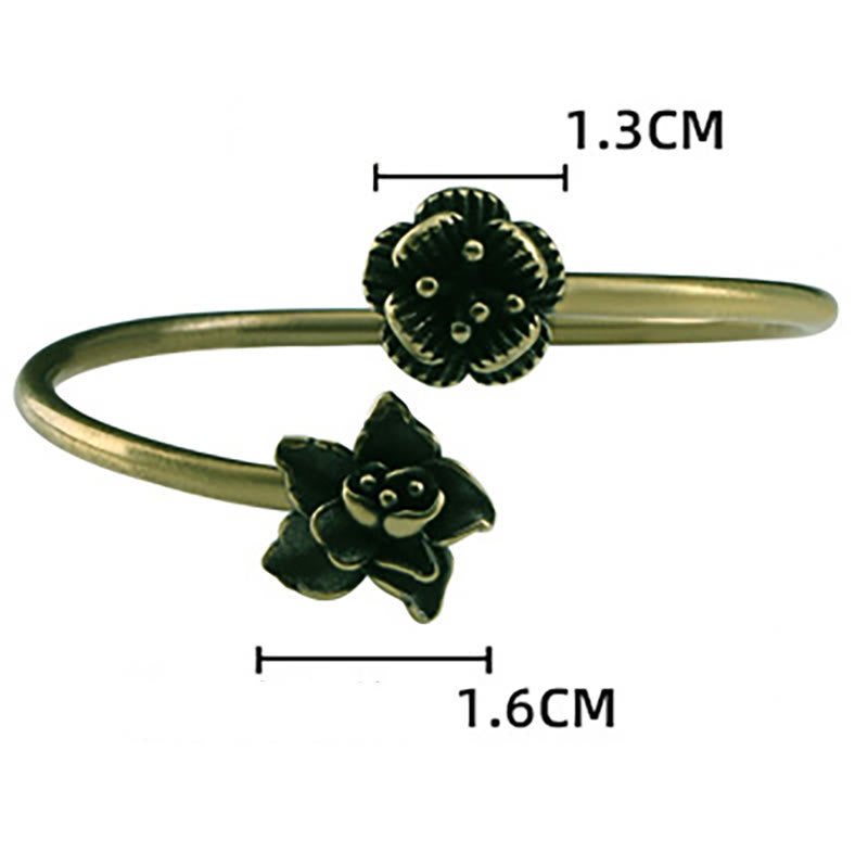 Pulsera curativa de latón y cobre con flores de durazno y Buddha Stones