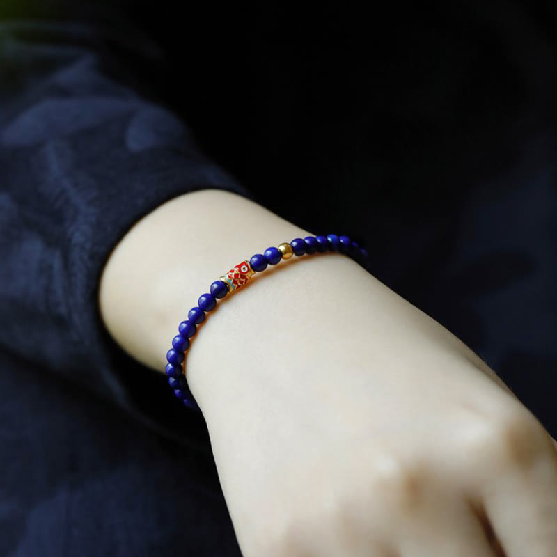 Pulsera positiva con pez koi y lazurita de Buddha Stones