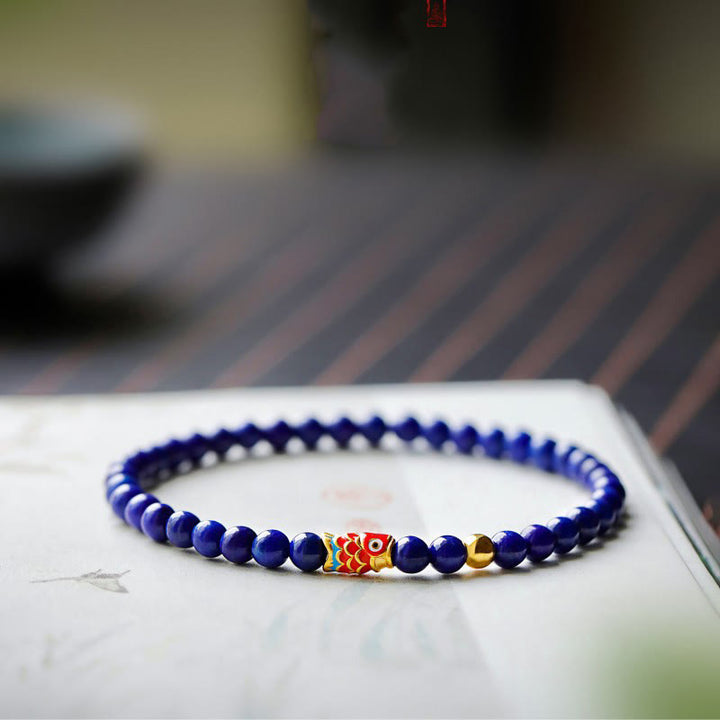 Pulsera positiva con pez koi y lazurita de Buddha Stones