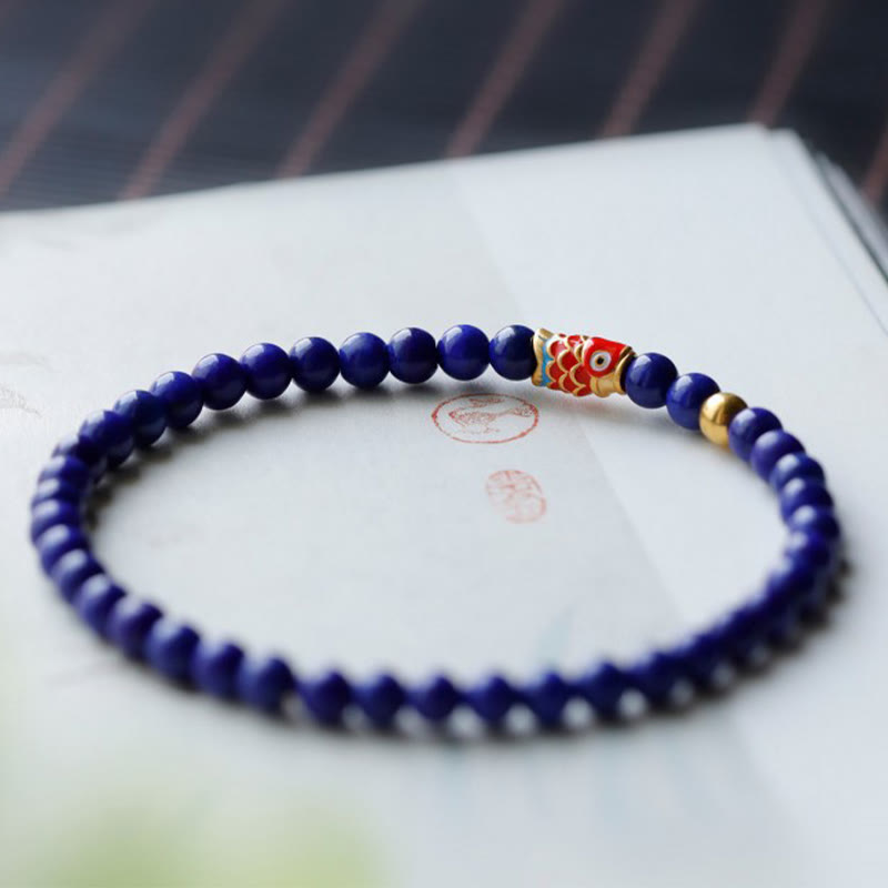 Pulsera positiva con pez koi y lazurita de Buddha Stones