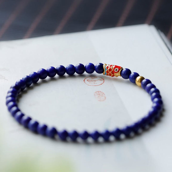 Pulsera positiva con pez koi y lazurita de Buddha Stones