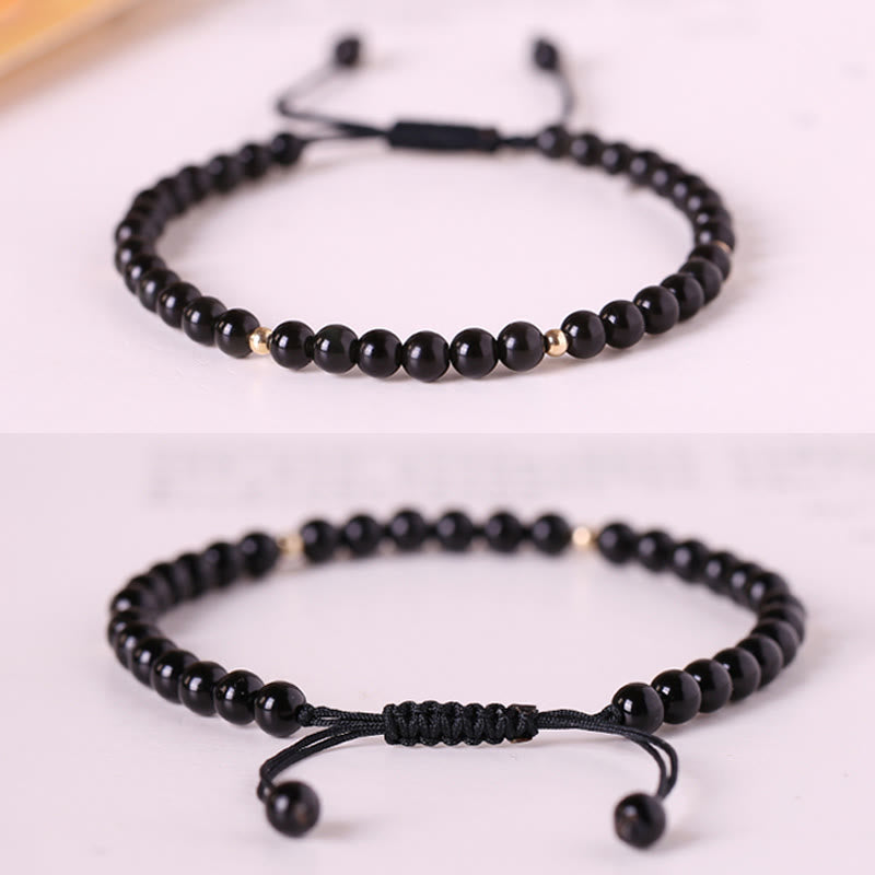 Pulsera de cuerda con cuentas pequeñas de obsidiana negra y Buddha Stones