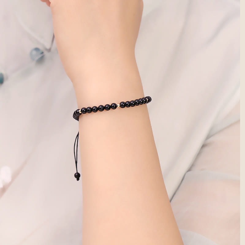 Pulsera de cuerda con cuentas pequeñas de obsidiana negra y Buddha Stones