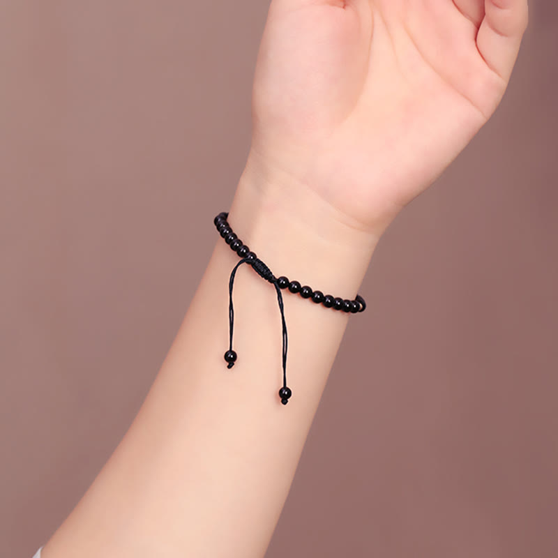 Pulsera de cuerda con cuentas pequeñas de obsidiana negra y Buddha Stones