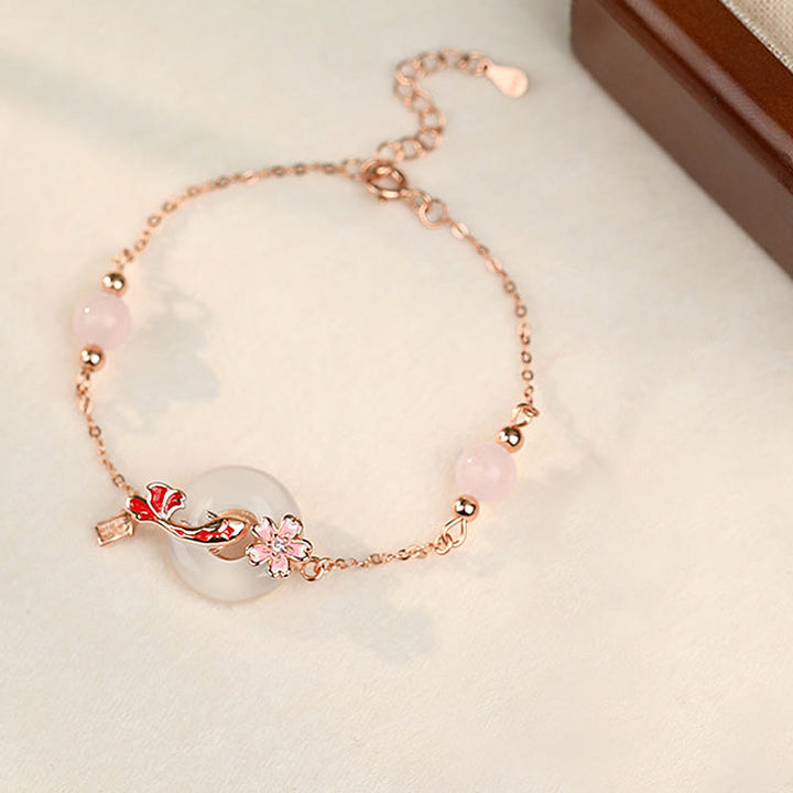 Pulsera positiva con hebilla de paz y flores de pez koi en plata de ley 925 con cristales de calcedonia rosa y Buddha Stones