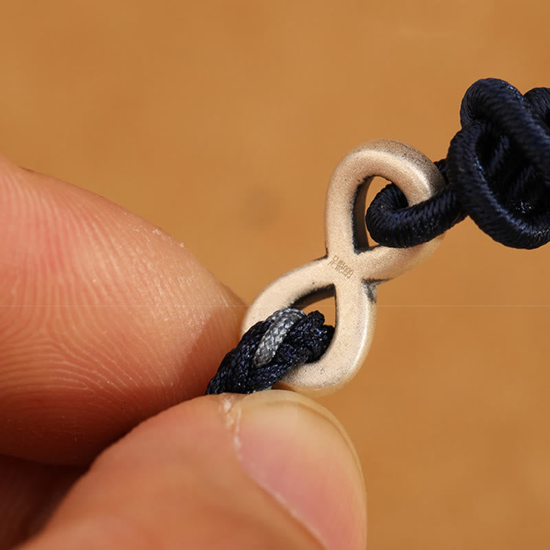 Pulsera de cuerda con símbolo de la suerte y nudo infinito hecha a mano en plata de ley 999 con Buddha Stones - image 15