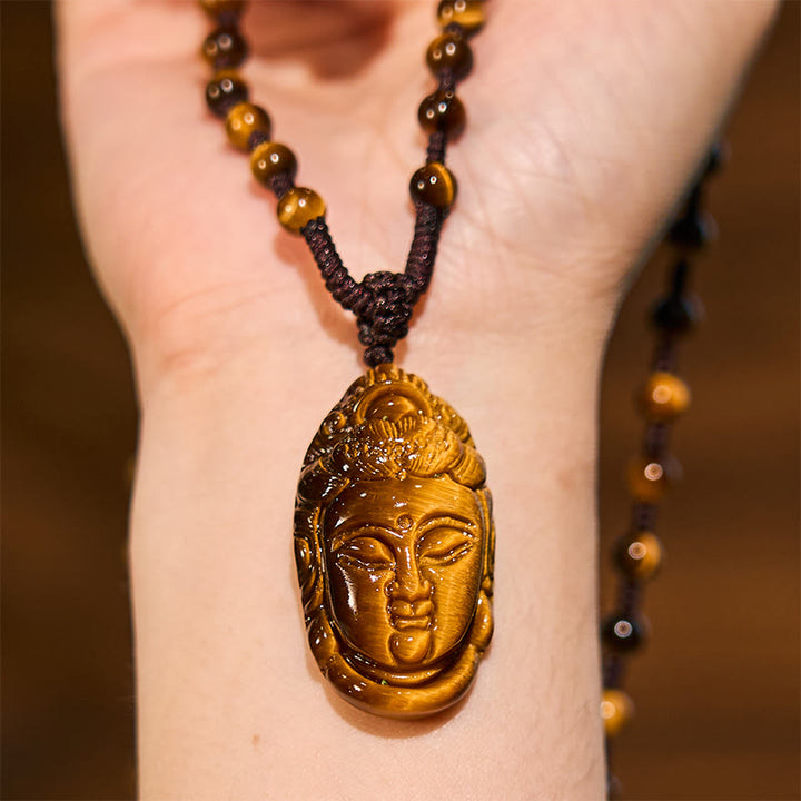 Collar con colgante de fuerza con cuerda y cabeza de Avalokitesvara, Kwan Yin, ojo de tigre y Buddha Stones