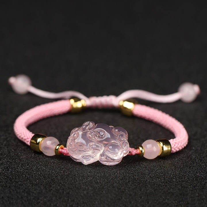 Pulsera trenzada de cristal rosa PiXiu con Buddha Stones