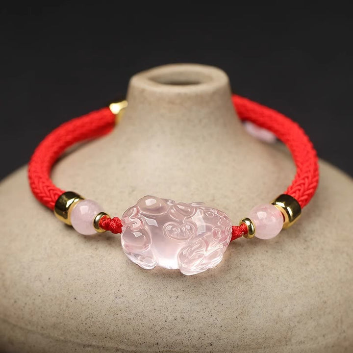 Pulsera trenzada de cristal rosa PiXiu con Buddha Stones