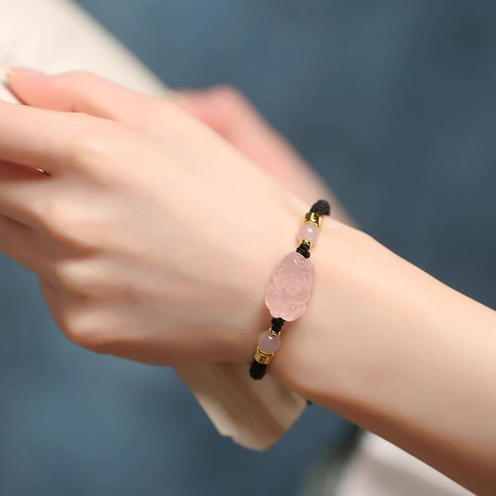 Pulsera trenzada de cristal rosa PiXiu con Buddha Stones