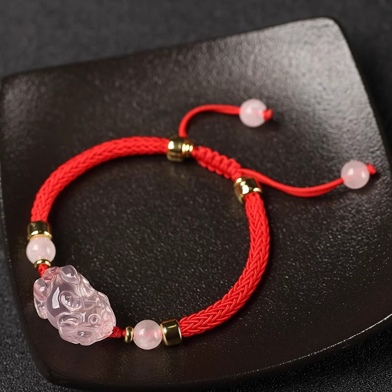 Pulsera trenzada de cristal rosa PiXiu con Buddha Stones