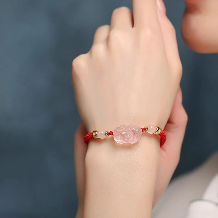 Pulsera trenzada de cristal rosa PiXiu con Buddha Stones