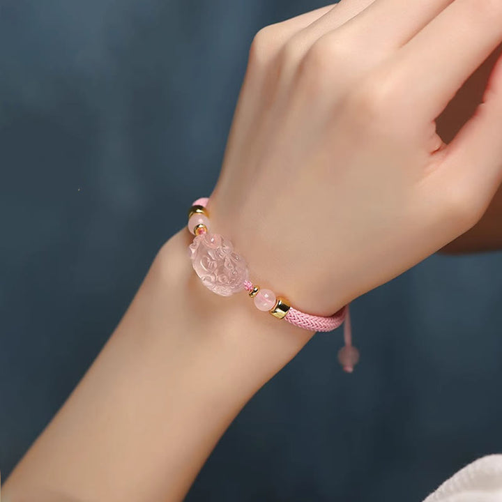 Pulsera trenzada de cristal rosa PiXiu con Buddha Stones