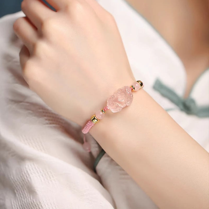 Pulsera trenzada de cristal rosa PiXiu con Buddha Stones