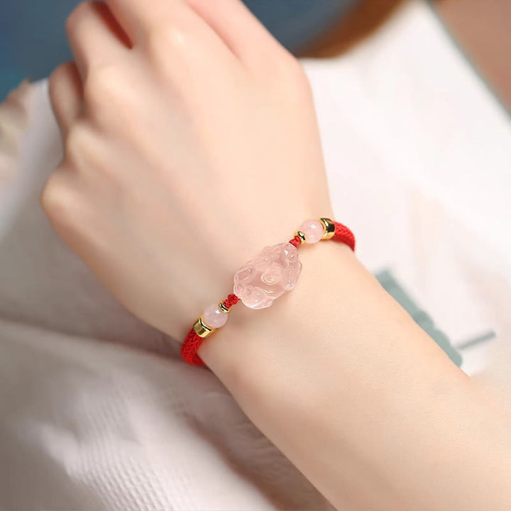 Pulsera trenzada de cristal rosa PiXiu con Buddha Stones