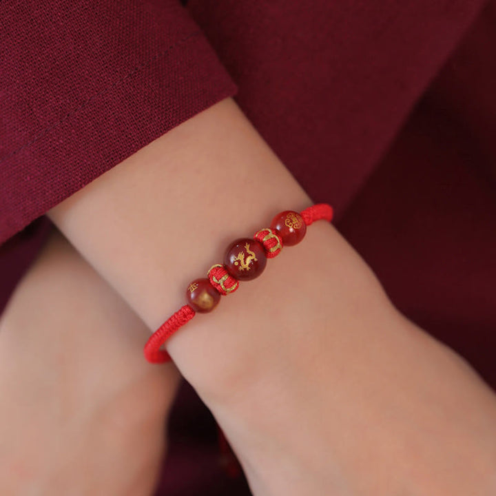 Pulsera trenzada de protección con hilo rojo del zodíaco chino y ágata roja hecha a mano con Buddha Stones