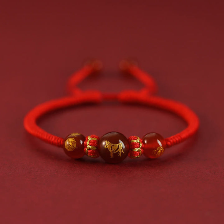 Pulsera trenzada de protección con hilo rojo del zodíaco chino y ágata roja hecha a mano con Buddha Stones