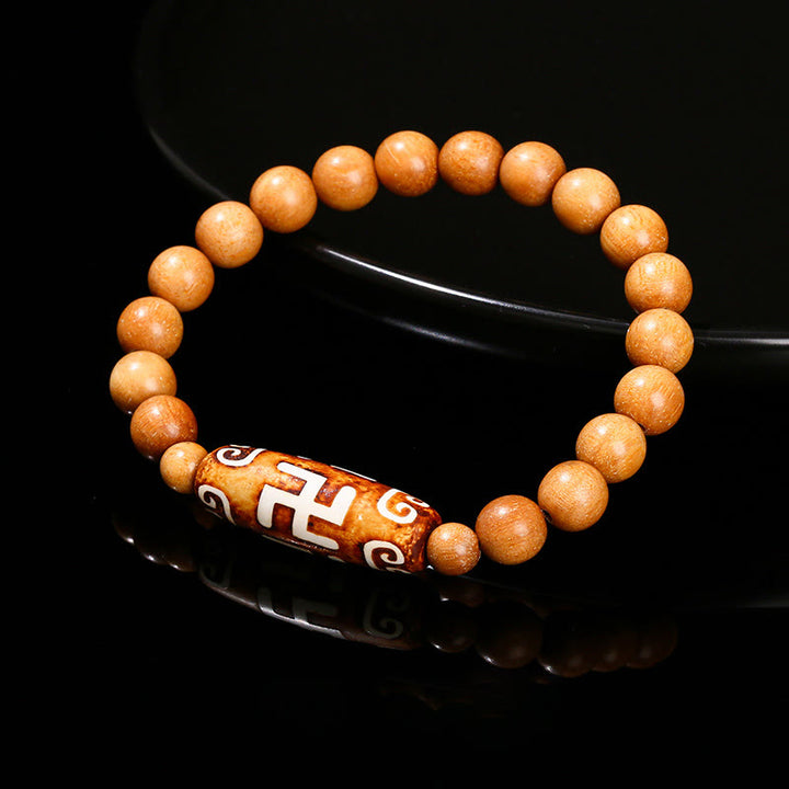 Pulsera de protección de energía con Buddha Stones de nueve ojos tibetanas de sándalo natural y ágata de ojo de gato blanca