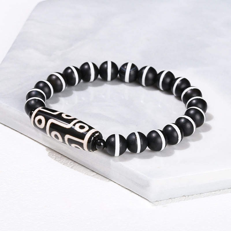 Pulsera de protección de energía con Buddha Stones de nueve ojos tibetanas de sándalo natural y ágata de ojo de gato blanca