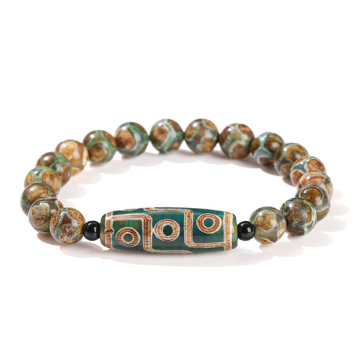 Pulsera de protección de energía con Buddha Stones de nueve ojos tibetanas de sándalo natural y ágata de ojo de gato blanca