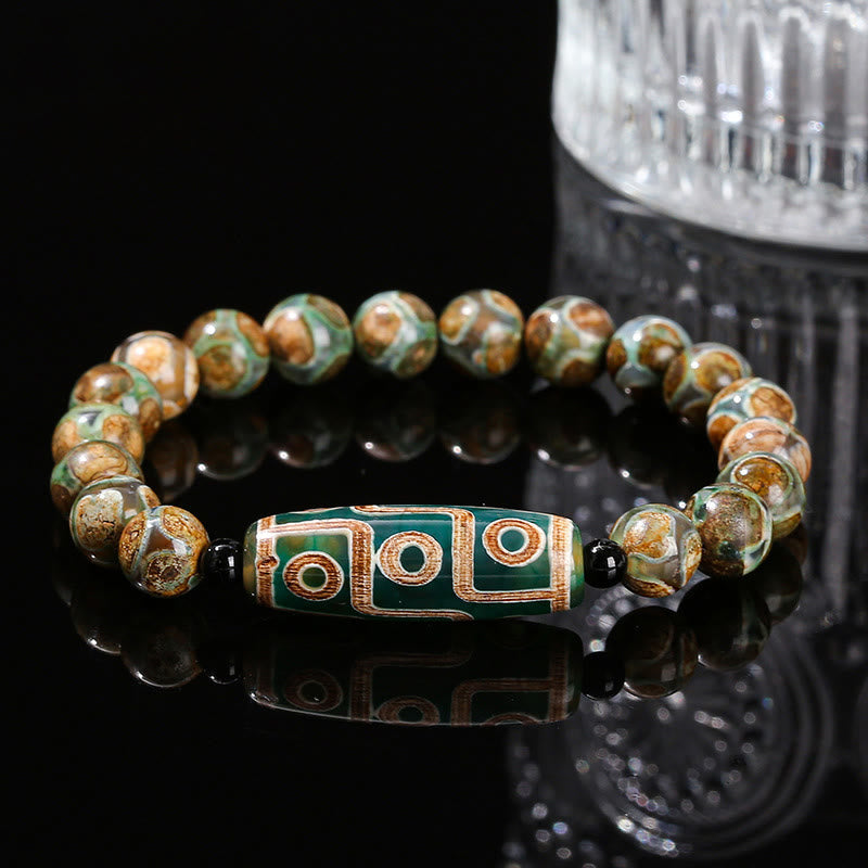 Pulsera de protección de energía con Buddha Stones de nueve ojos tibetanas de sándalo natural y ágata de ojo de gato blanca