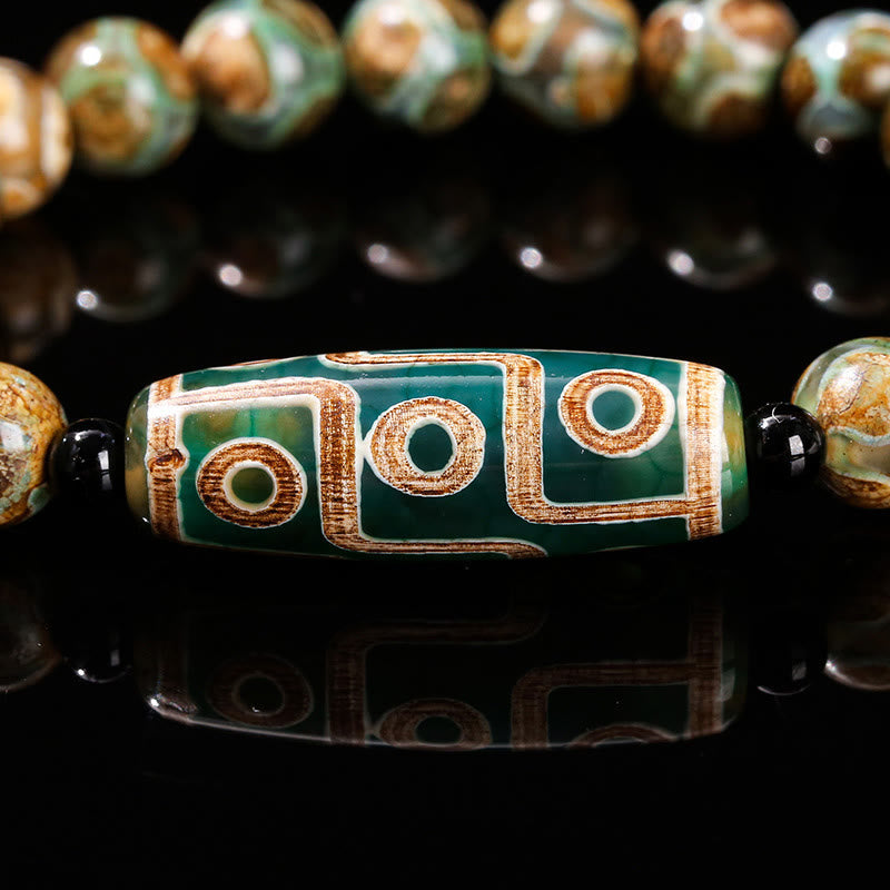 Pulsera de protección de energía con Buddha Stones de nueve ojos tibetanas de sándalo natural y ágata de ojo de gato blanca