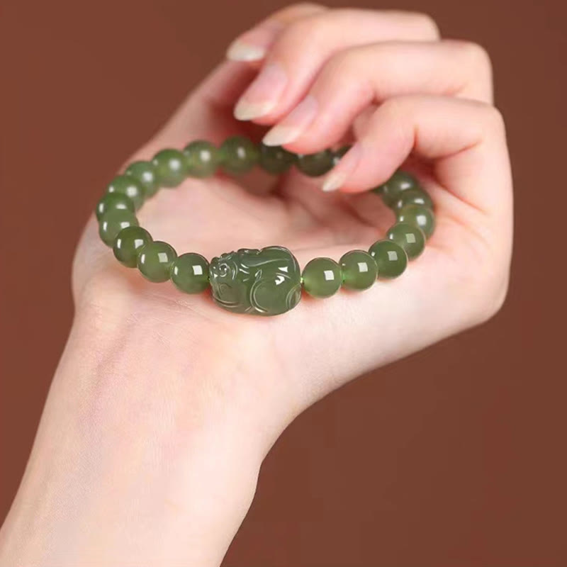 Buddha Stones Pulsera de la suerte tallada en jade PiXiu de Hetian natural
