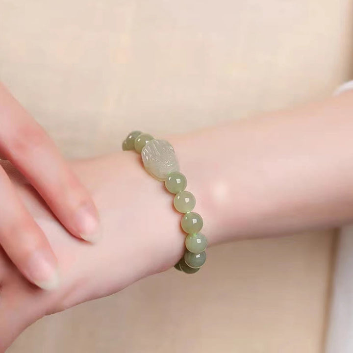Buddha Stones Pulsera de la suerte tallada en jade PiXiu de Hetian natural