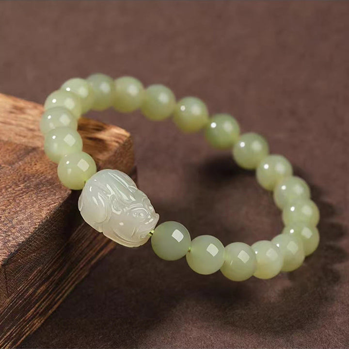 Buddha Stones Pulsera de la suerte tallada en jade PiXiu de Hetian natural