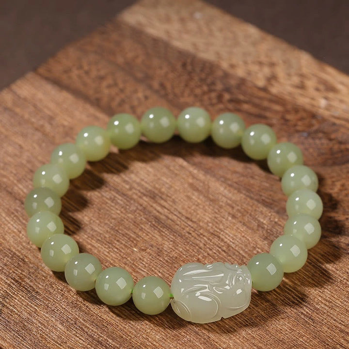 Buddha Stones Pulsera de la suerte tallada en jade PiXiu de Hetian natural
