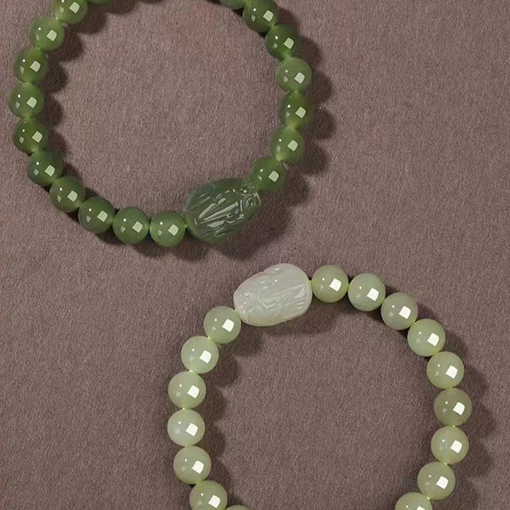 Buddha Stones Pulsera de la suerte tallada en jade PiXiu de Hetian natural