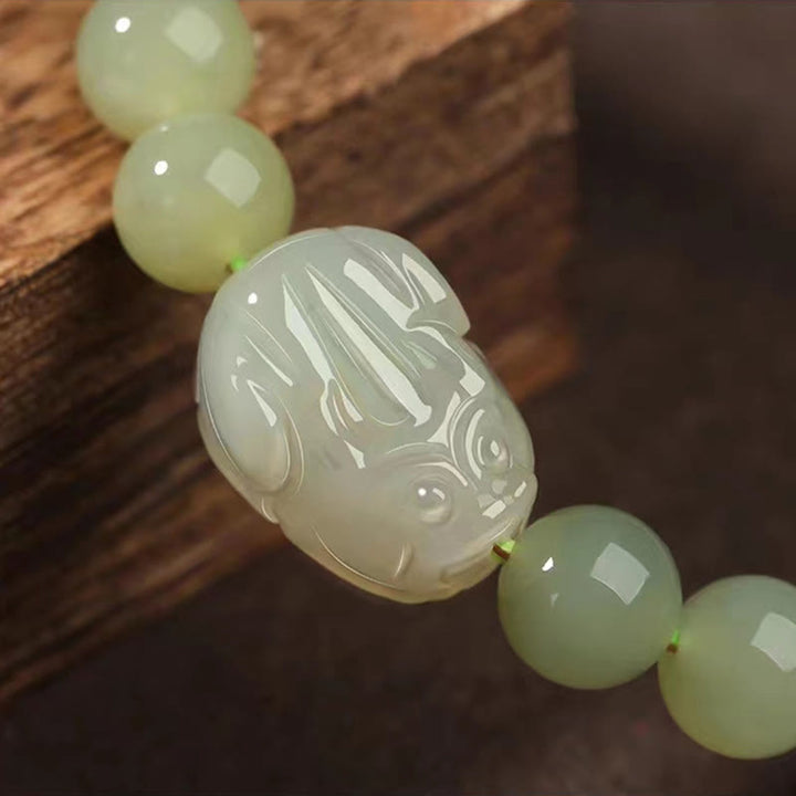 Buddha Stones Pulsera de la suerte tallada en jade PiXiu de Hetian natural