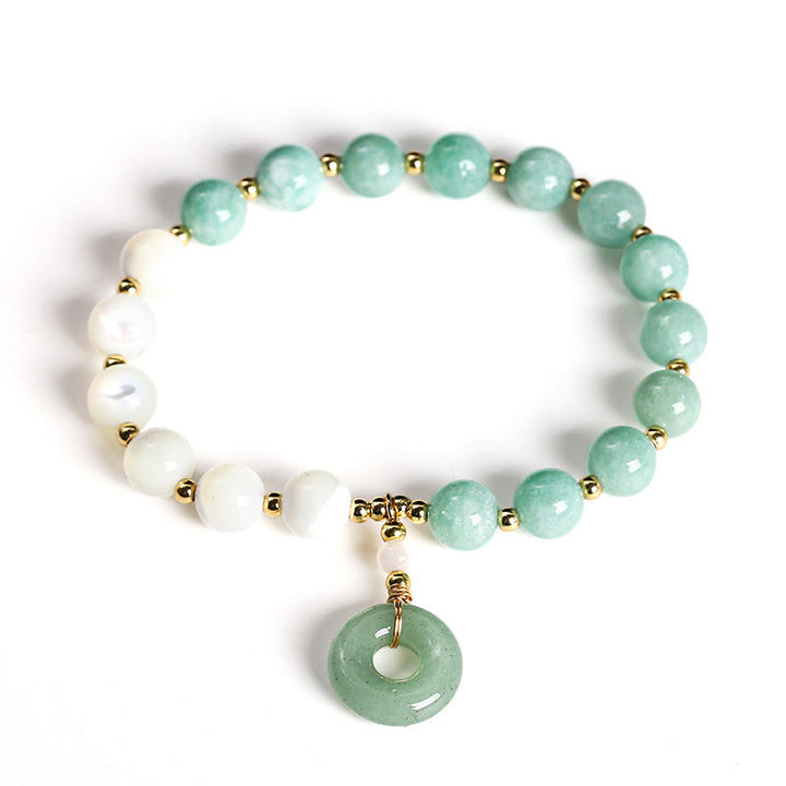 Pulsera con dije de paz y hebilla de caracol, herradura, trochus y Buddha Stones