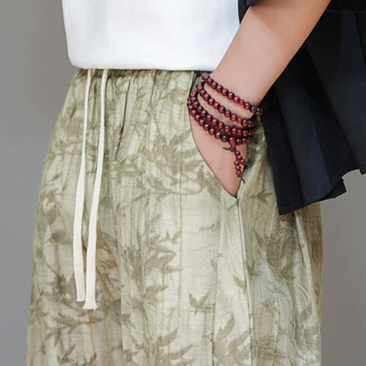 Pantalones con cordón y bolsillos para hombre con botones en los tobillos de bambú y Buddha Stones