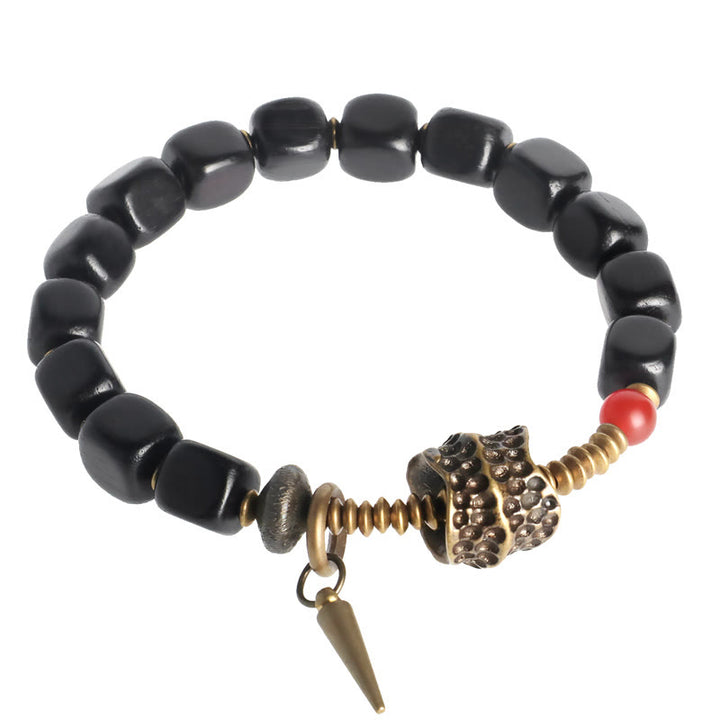 Pulsera de la paz con Buddha Stones, ébano, madera, cobre, latón y ágata roja
