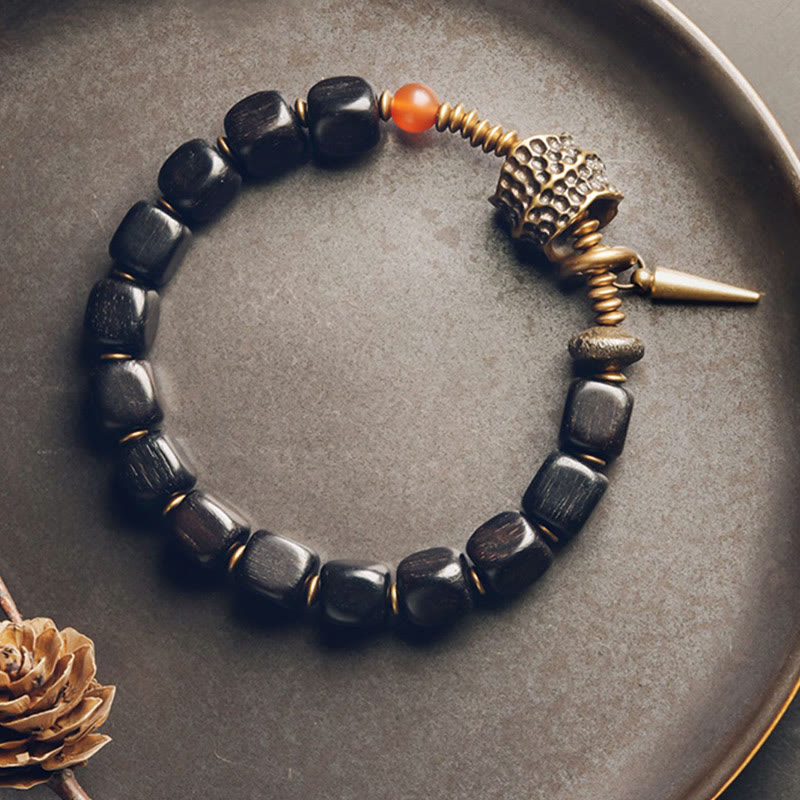 Pulsera de la paz con Buddha Stones, ébano, madera, cobre, latón y ágata roja