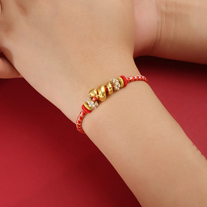 Pulsera trenzada con hilo rojo degradado y Buddha Stones en plata de ley 999 con el año de la serpiente y la suerte