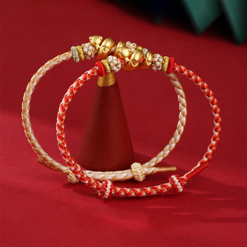 Pulsera trenzada con hilo rojo degradado y Buddha Stones en plata de ley 999 con el año de la serpiente y la suerte