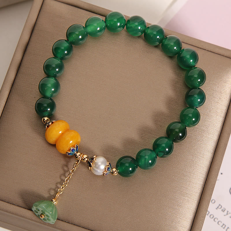 Pulsera de soporte con vaina de loto, ámbar, perla y ágata verde de Buddha Stones