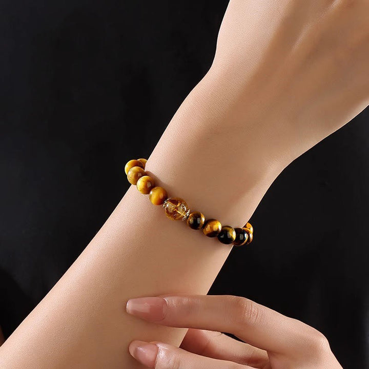 Pulsera de fuerza con citrino y ojo de tigre negro y amarillo natural de Buddha Stones