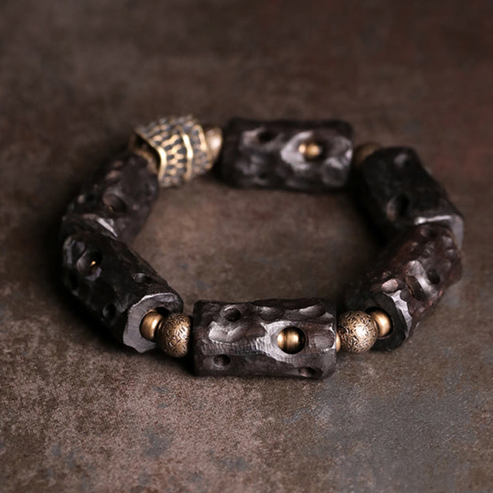 Pulsera de calma con Buddha Stones, madera de ébano, cobre y latón