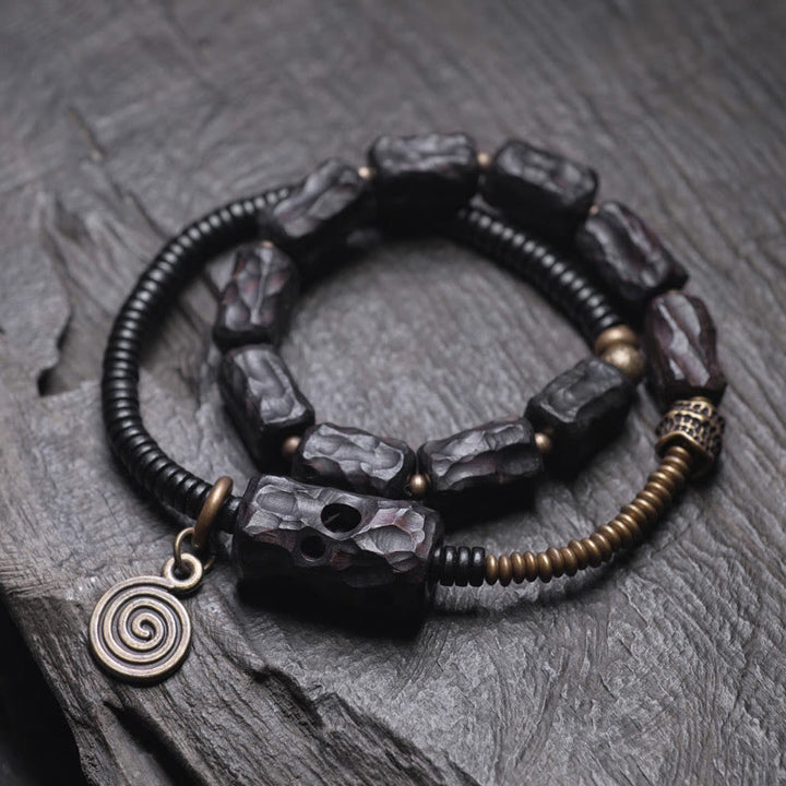 Pulsera de doble vuelta con Buddha Stones, madera de ébano, cobre, latón y ágata roja