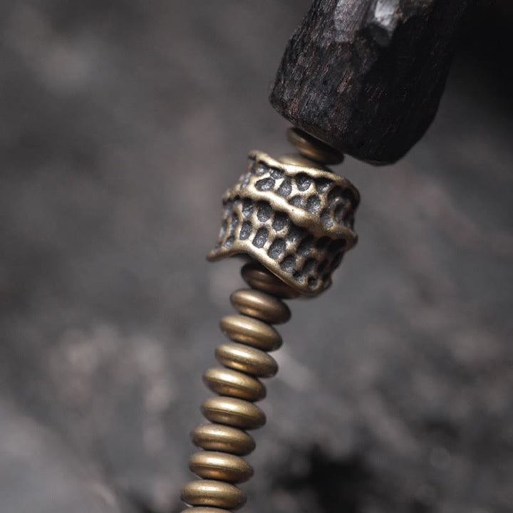 Pulsera de doble vuelta con Buddha Stones, madera de ébano, cobre, latón y ágata roja