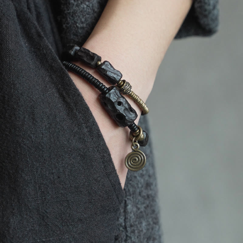 Pulsera de doble vuelta con Buddha Stones, madera de ébano, cobre, latón y ágata roja