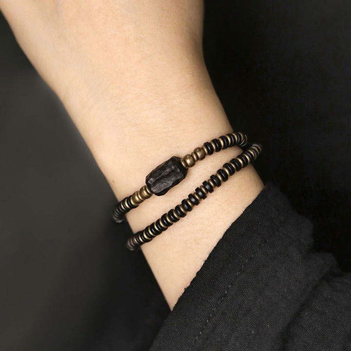 Pulsera de doble vuelta con Buddha Stones, madera de ébano, sándalo verde, cobre y latón
