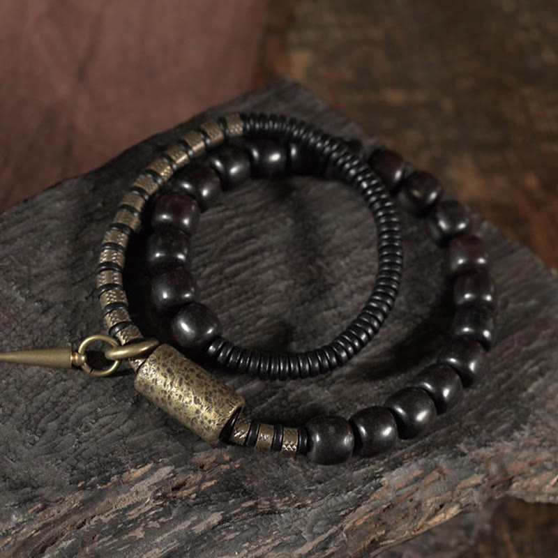 Pulsera de equilibrio de doble vuelta con cuentas cónicas vintage de madera de ébano, cobre y latón con Buddha Stones