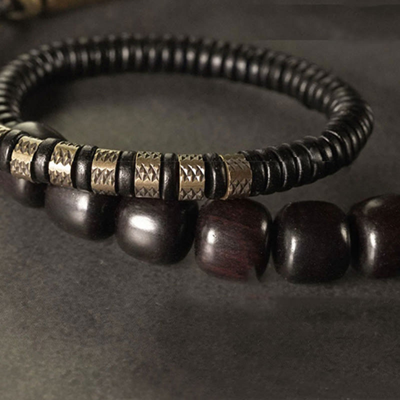 Pulsera de equilibrio de doble vuelta con cuentas cónicas vintage de madera de ébano, cobre y latón con Buddha Stones
